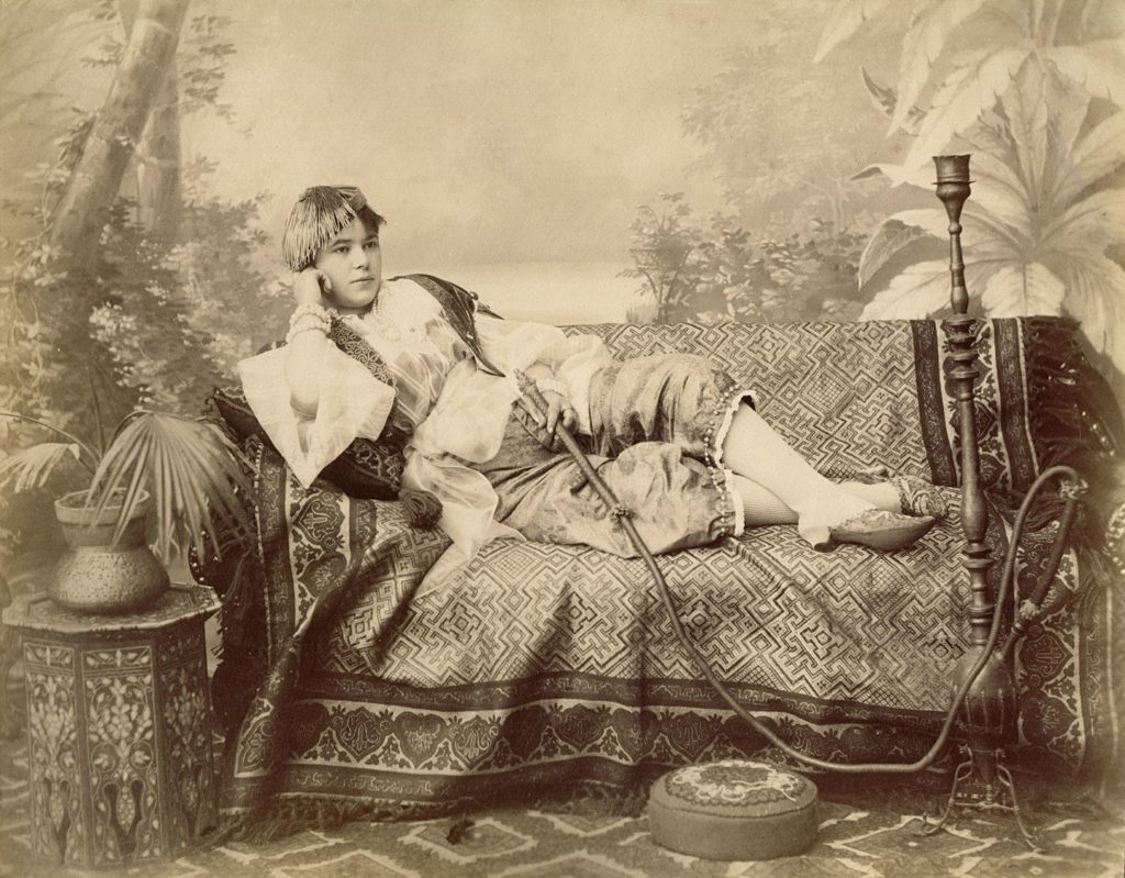 A lady and water pipe (c.1870s)