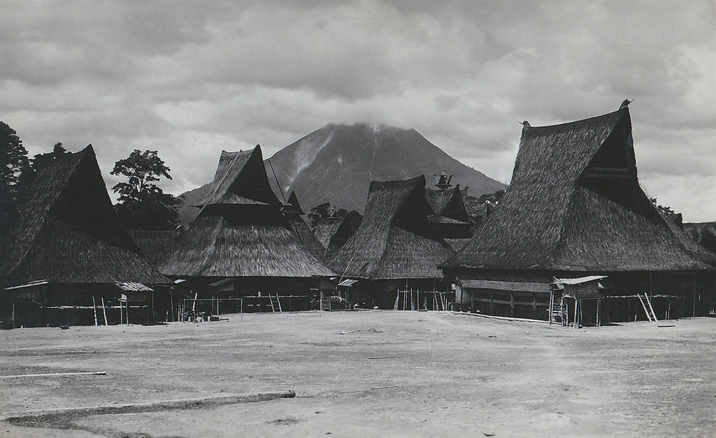 The thatched-roof houses of Sumatran village, Indonesia